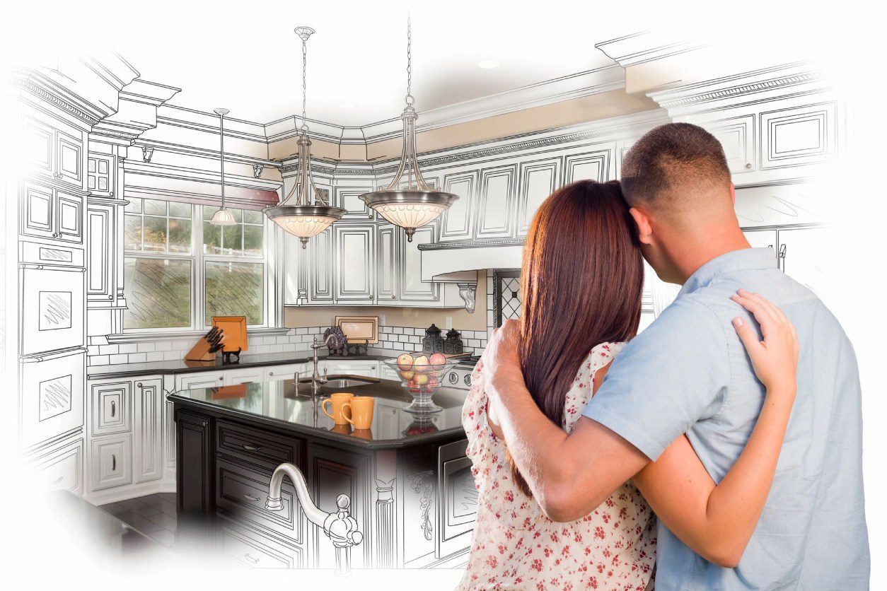 A couple is hugging in the kitchen of their new home.